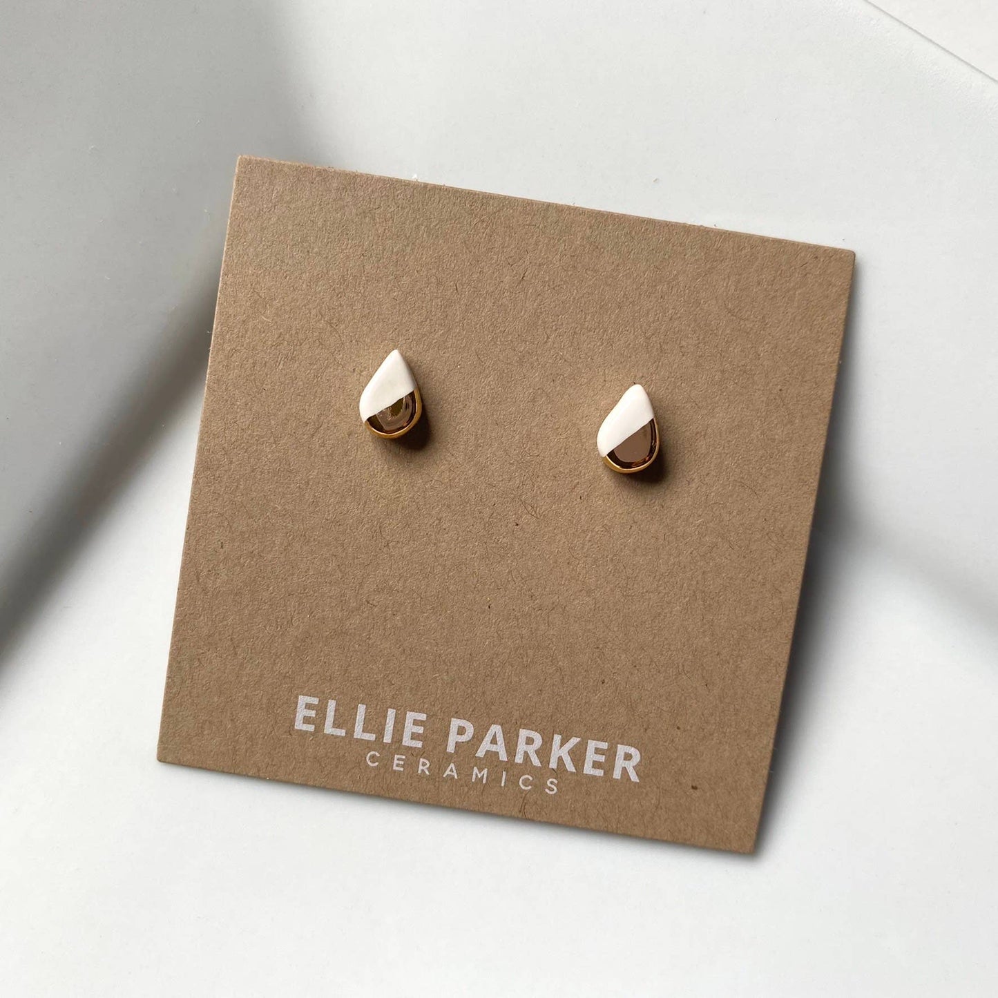 Ellie Parker Teardrop White Ceramic Gold Accent Stud Earrings